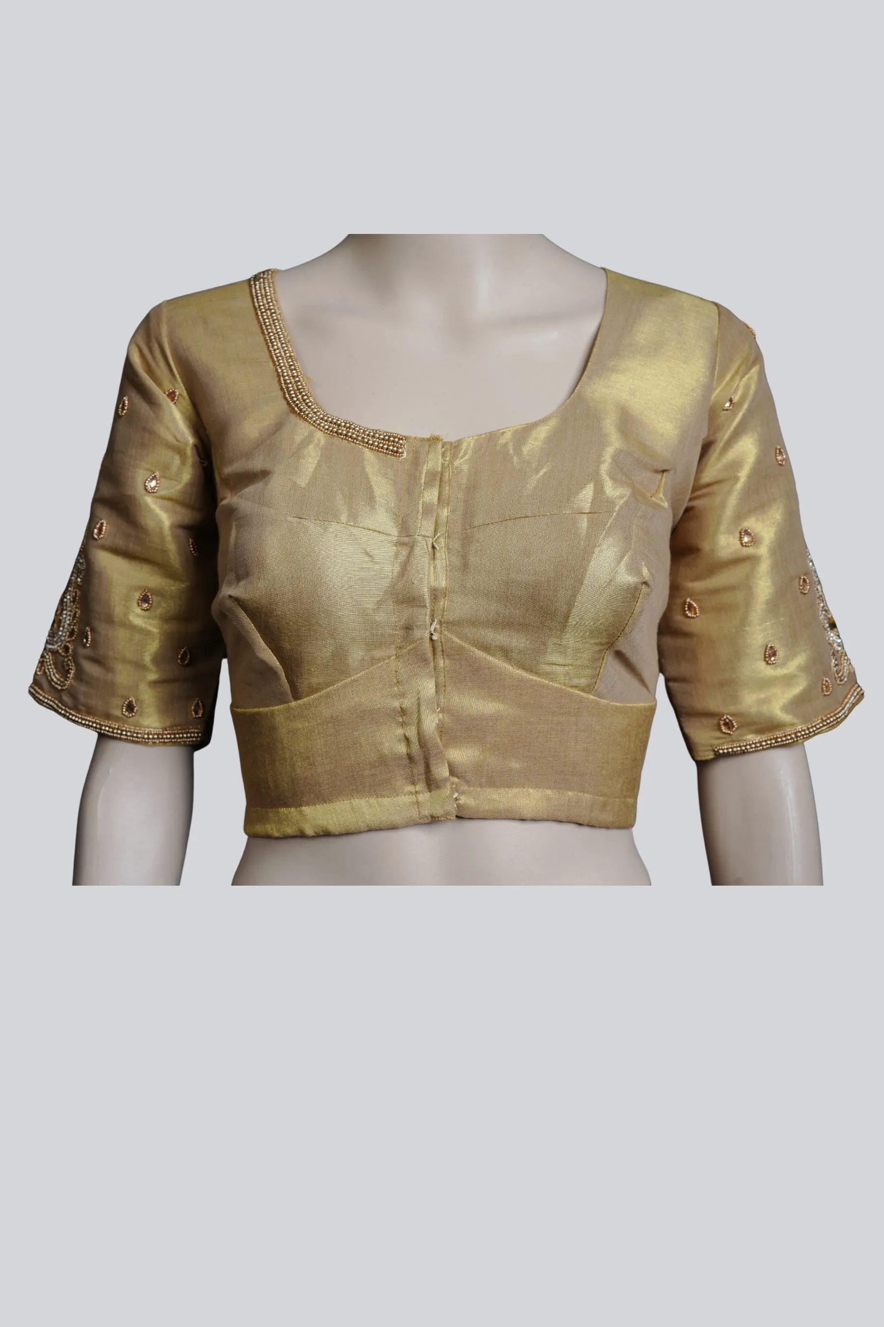 Graceful Bridal Elegance: Maggam Work Blouse with Stunning Back Tassels