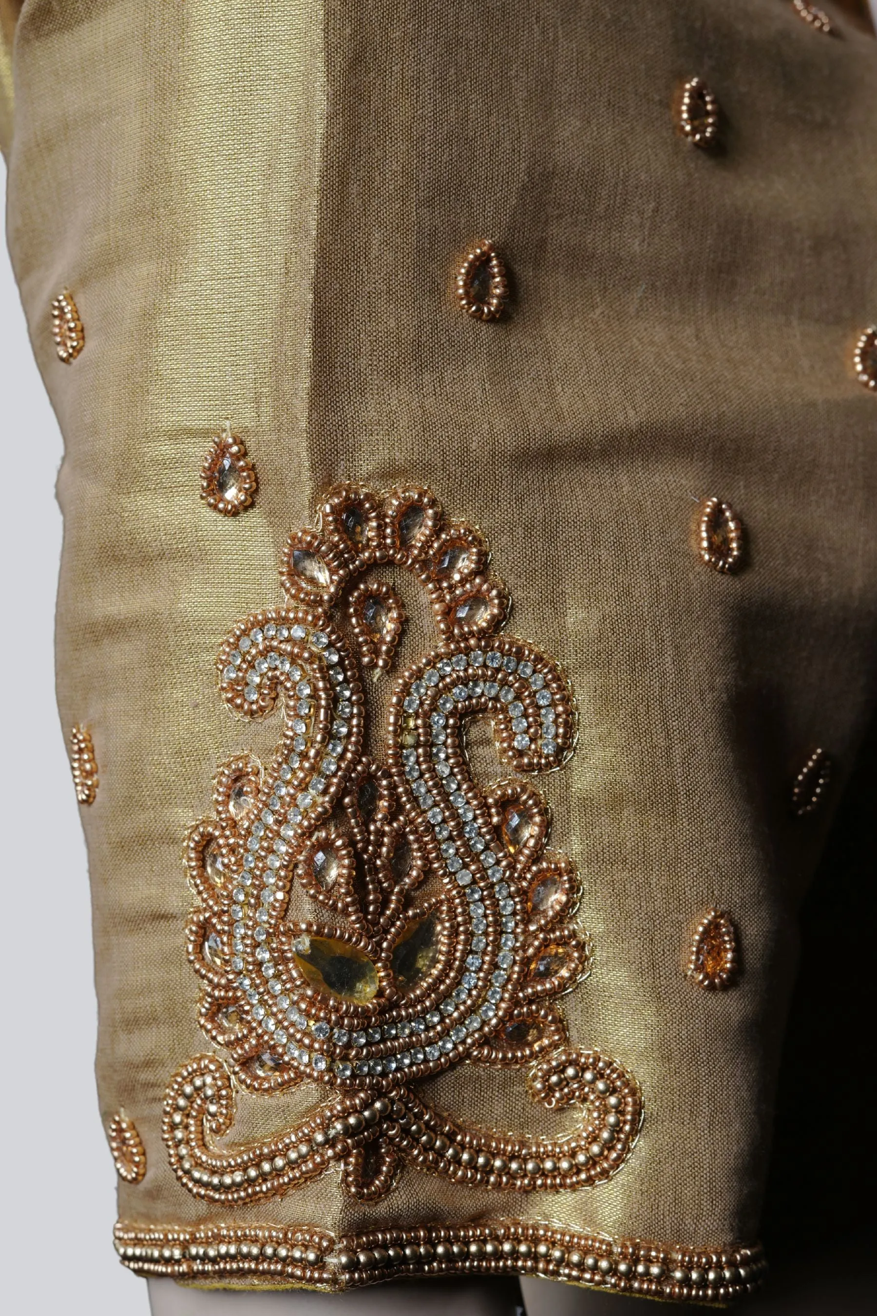 Graceful Bridal Elegance: Maggam Work Blouse with Stunning Back Tassels