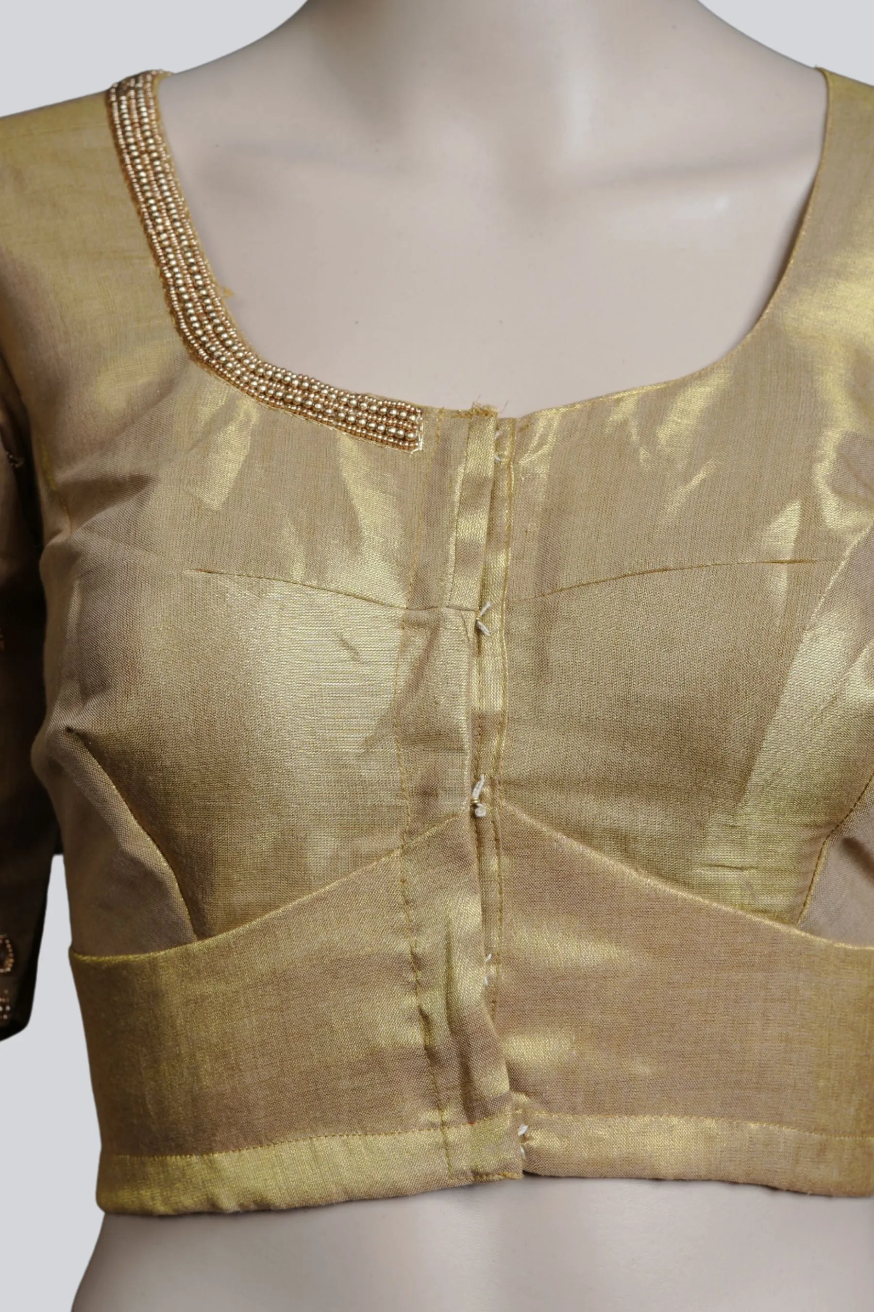 Graceful Bridal Elegance: Maggam Work Blouse with Stunning Back Tassels